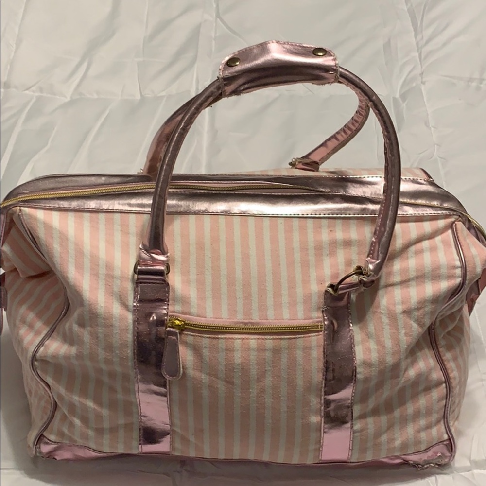 Heavily worn authentic Victoria secret tote.